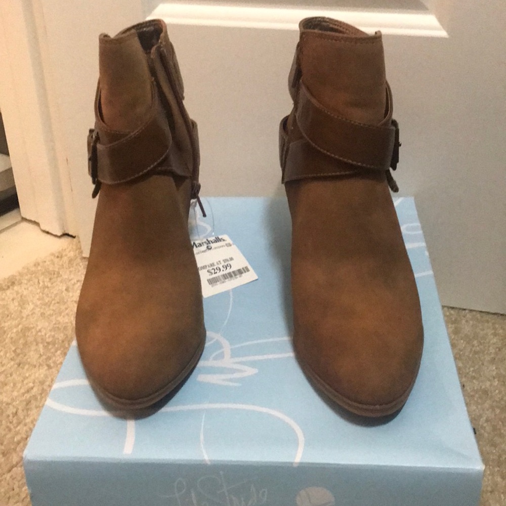 Never been worn.  Life stride booties. Tan color